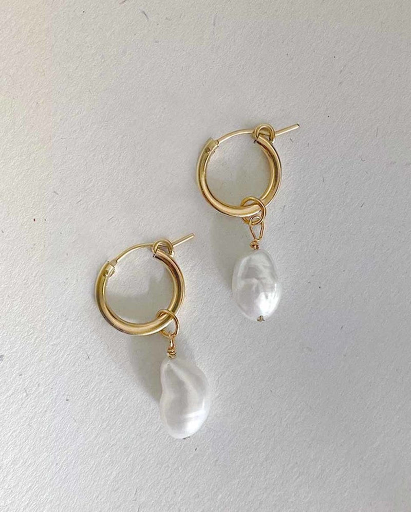 Angela Wozniak Earrings: Unique Studs & Hoops Collection